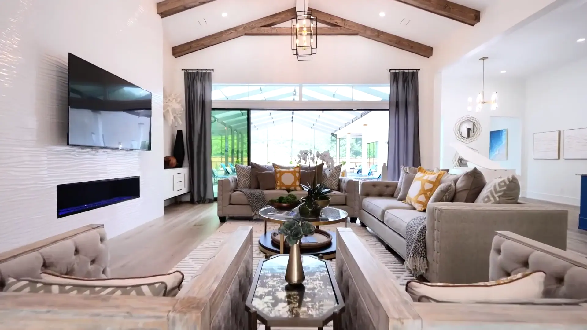The vaulted sitting room at Ridgeview House, with exposed oak ridge beams